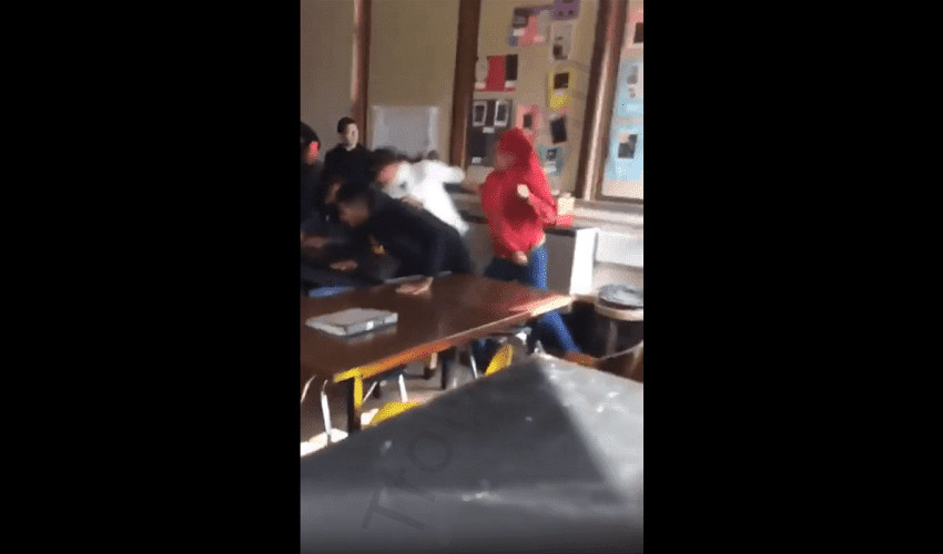 Dude Gets Mad And Beat Up Two Of His Classmates For Accidentally Hitting The Teacher While Fighting!