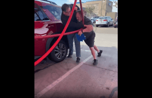 Manager Tries To Stop Two Guys From Going At It At The Carwash!