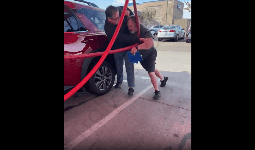 Manager Tries To Stop Two Guys From Going At It At The Carwash!