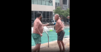 Two Swimmers Gets Into A Fade At The Pool