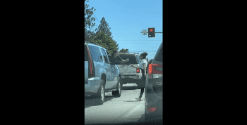 Woman That Was Ready To Catch A Fade Gets Into A Spitting Contest With Another Woman In Traffic During Road Rage