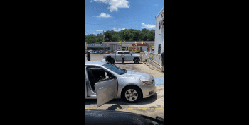 Dude Gets Restrained By Community After He Went Around Bussin Out Random People Car Windows