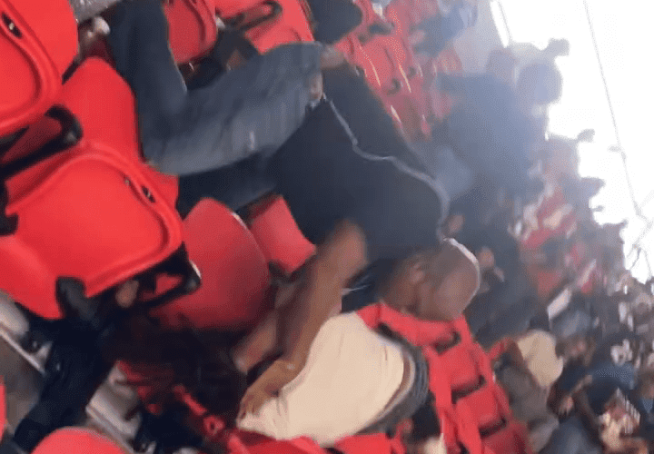 Dude Gets Slung Around By His Dreads For Talking Crazy At A Football Game