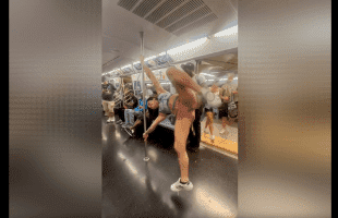 Girl With A Wet Spot Shows Off Her Pole Skills On The Train