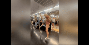 Girl With A Wet Spot Shows Off Her Pole Skills On The Train