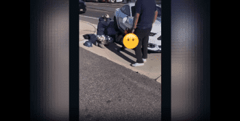 Dude Gets His Head Stuck Under A Car Wheel After He Was Hit By A Careless Driver