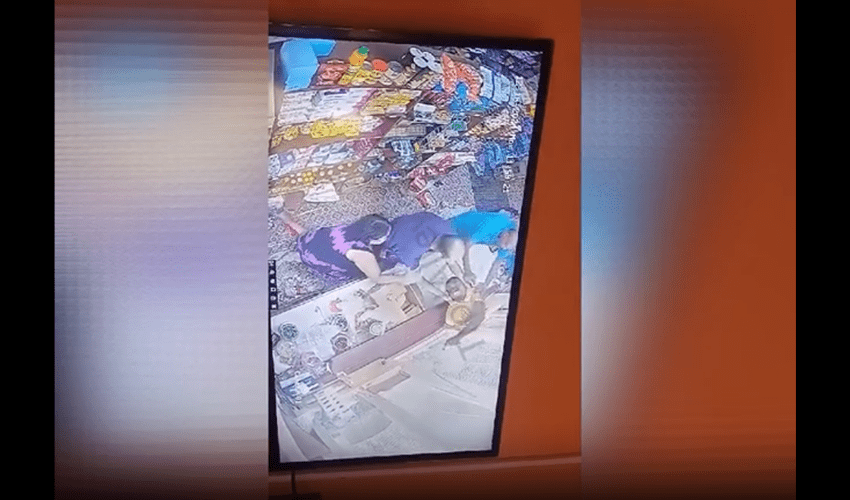 Store Owners Was Not Letting This Thief Escape After He Squeeze Thru Their Store Window To Steal