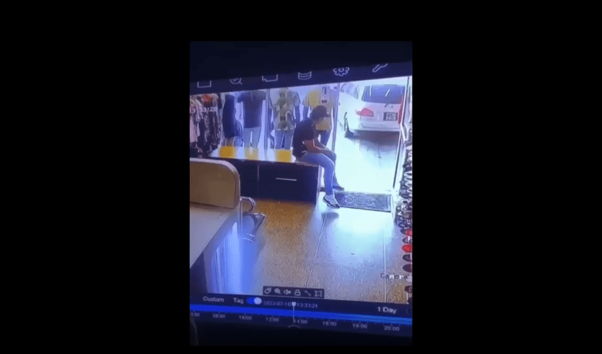 Man Gets Laid Out In His Clothing Store By The Opps That Was Parked In Front Of His Business!