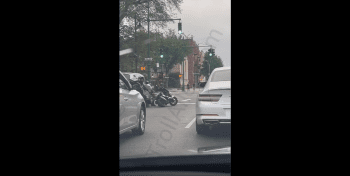 Dude Almost Got His Motor Scooter Took In Traffic But His Homie Pulled Up!