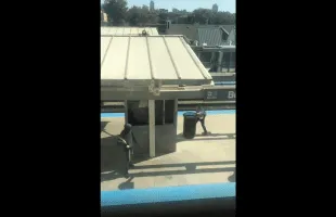 Security Guard Runs From A Angry Man With A Stick While On The Job!