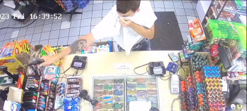 Dude Caught On Camera Robbing A Houston Convenience Store With His Shirt As A Mask!