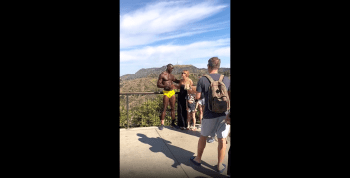 Woman With Her Small Daughter Wanted Her Husband To Take Her A Picture Beside A Shaped Up Blk Man!
