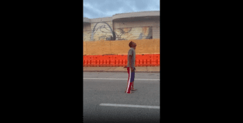 Dude Tries To Save A Guy That Was Walking In The Middle Of The Street High On Sugar!