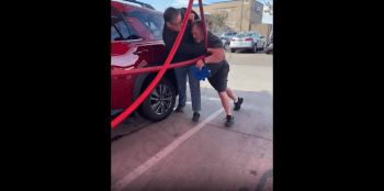 Manager Tries To Stop Two Guys From Going At It At The Carwash!
