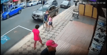 Woman Gets Stomped By Man For Randomly Hitting A Child While With Her Mother!