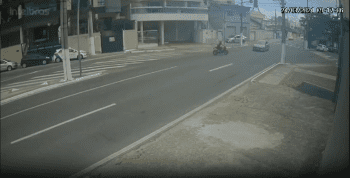 Dude On Motor Bike Gets Caught Lacking By A Car!