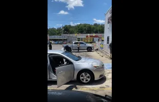 Dude Gets Restrained By Community After He Went Around Bussin Out Random People Car Windows