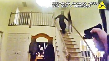 Police Officer Fires On Armed Man Charging Down Stairs With Two Swords