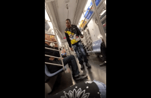 Old Guy With A Donut Gets Smacked After He Said The Wrong Word To A Man On The Train