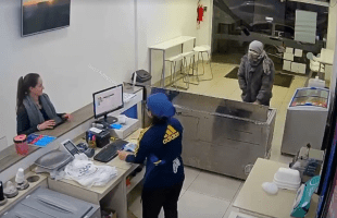 Robber Had No Respect For The Paying Customer During A Heist