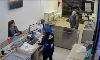 Robber Had No Respect For The Paying Customer During A Heist