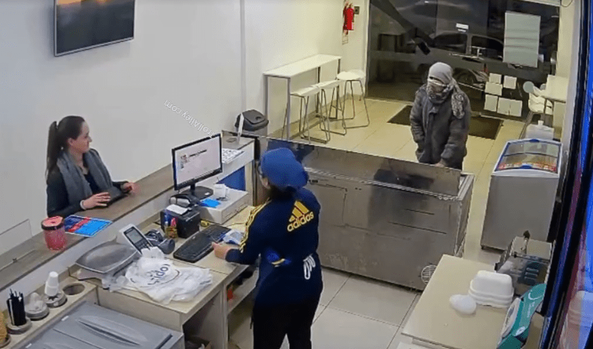 Robber Had No Respect For The Paying Customer During A Heist