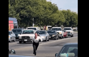 Girl Crashed Out In Traffic Over Her Man And Went After The Camera Man After She Seen Him Recording