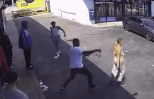 Instant Karma: Woman Gets Saved After A Man Tripped Her For No Reason And Then His Opps Came Out Of Nowhere Shooting