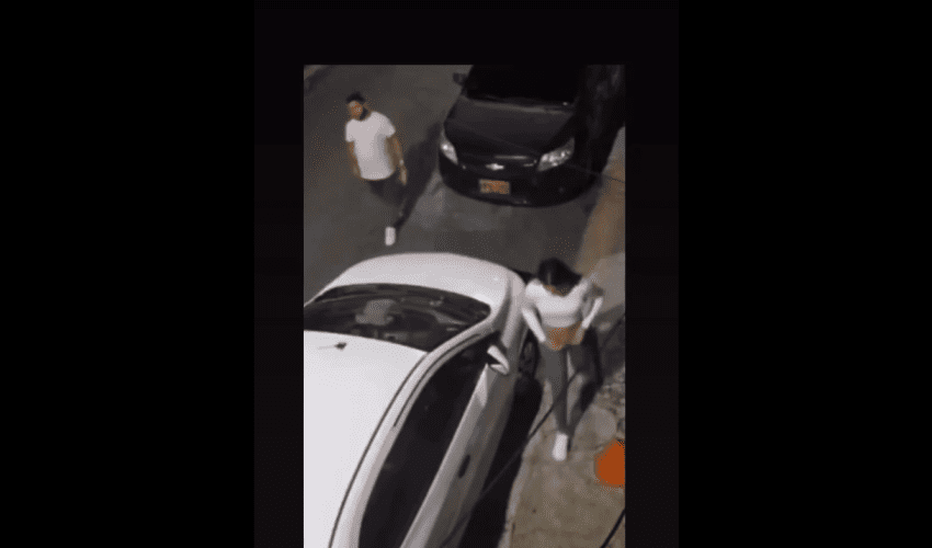 Dude Had No Shame And Was Watching Out For His Girlfriend While She Go Do This Behind A Car