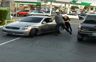 Girl Hopped Out On A Man After He Kept Putting Hands On Her Boyfriend During A Road Rage