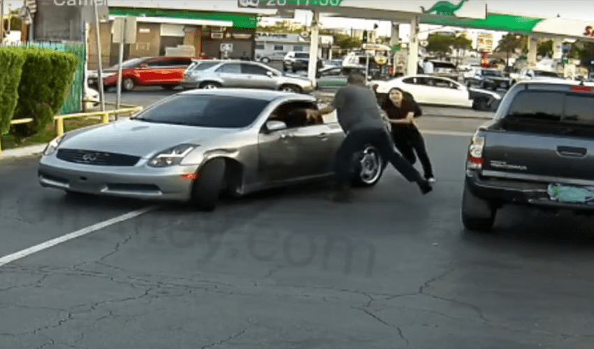 Girl Hopped Out On A Man After He Kept Putting Hands On Her Boyfriend During A Road Rage