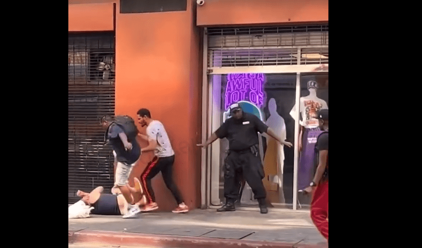 Security Guard Refuse To Help A Guy That Was Getting Jumped Right In Front Of Him