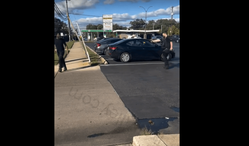 Security Guard Crashed Out On His Job After Using His Strap To Scare Off A Guy That Was Playing With Him