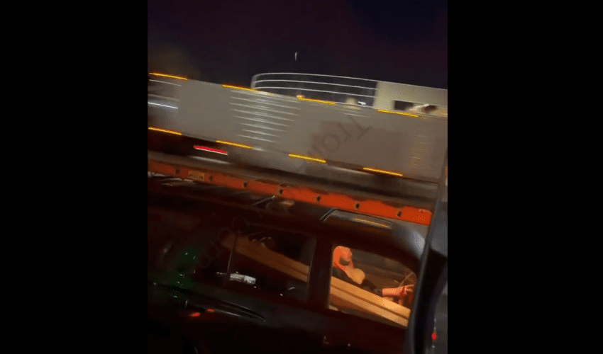 Dude Caught A Freaked Out Guy In Traffic Doing This While Driving His Truck