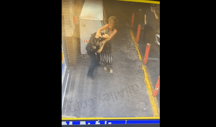 Police Officer Gets Handled By A Homeless Lady At The Store