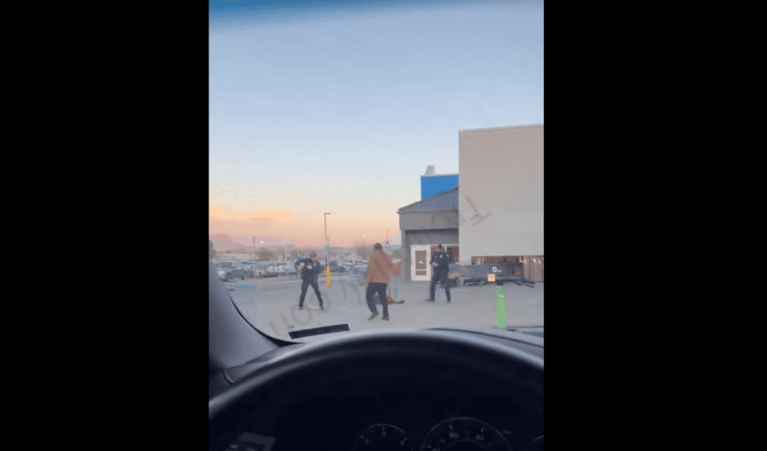 Dude Handles Two Police Officers At Walmart Pick Up