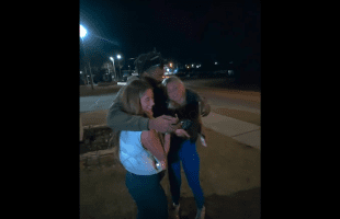 Two White Guys Had No Problem With Their Two Girlfriends Being Hugged On By A Black Guy While Taking A Picture