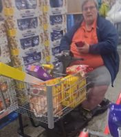 Man At Costco Goes Off After A Guy On A Grocery Cart Made A Smart Remark About His Shirt
