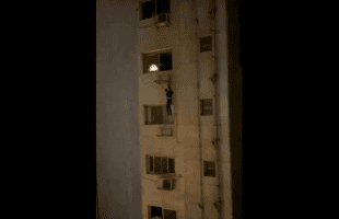 Residents In A Apartment Building Saves A Thief From Falling After They Caught Him Breaking Into Their Homes