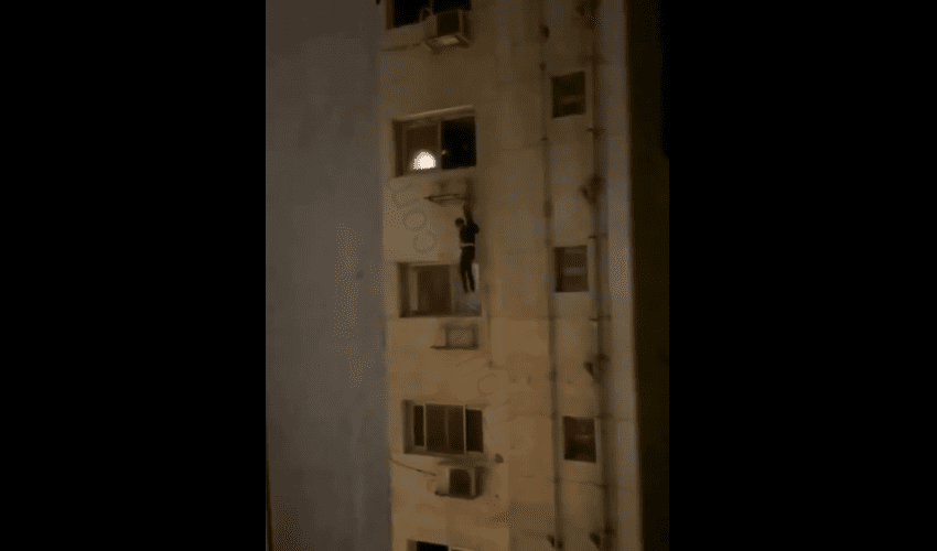 Residents In A Apartment Building Saves A Thief From Falling After They Caught Him Breaking Into Their Homes