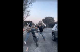 Dude Gets Pushed Off His Dirk Bike By A Guy For Riding Reckless In The Streets