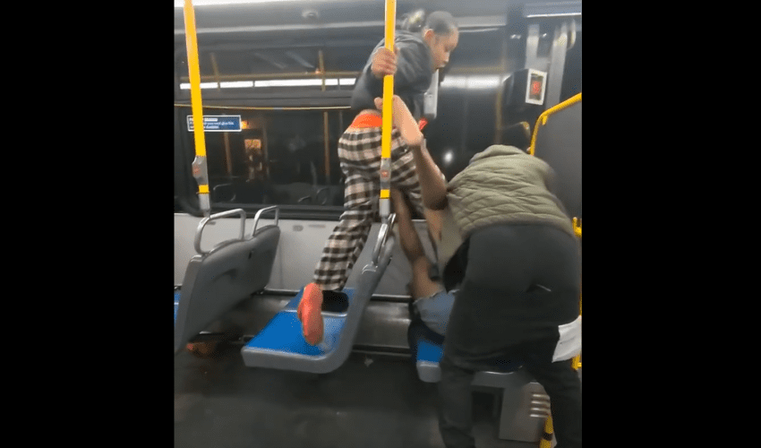 Woman Helps Her Boyfriend Handle A Drunk Woman On The Bus After She Put Hands On Him