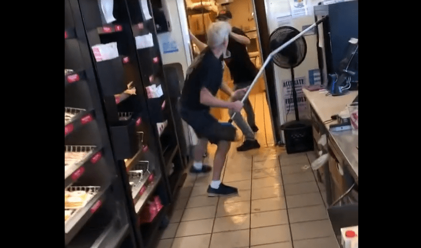 Employee Cracked A Customer With A Broomstick After He Came Behind The Counter To Put Hands On Him