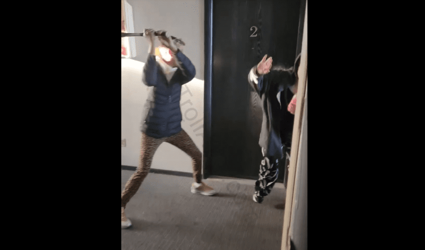 Woman Runs In A Man House After Another Woman Confronted Her With A Baseball Bat