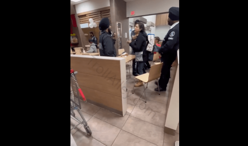 Security Puts Hands On A Woman That Pushed His Face Back After She Was Told To Leave