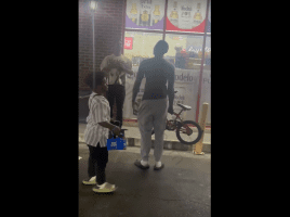 Small Man Was Mad Because They Was Going At It With His Bike