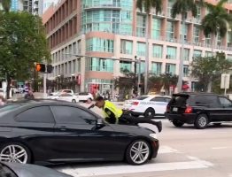 Miami Police Officer Missed At Close Range After Dude Drove Off With Him On The Hood Of His Car