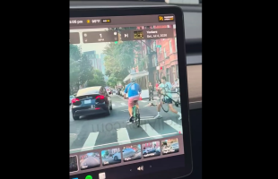 Dude Caught Two Guys This On His Tesla Camera That Got In A Altercation While Riding Their Bikes