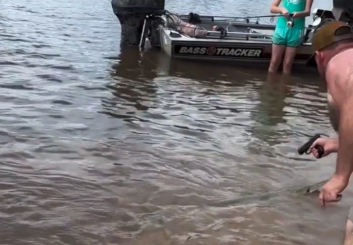 Dude Had A Difficult Time Trying To Take Out A Big Gar Fish With A Hi Point