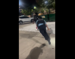Police Falls After Putting His Gun Away